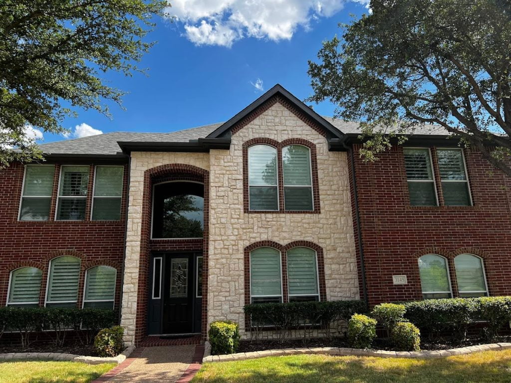 repaired foggy windows on a two-story residential property Hurst TX