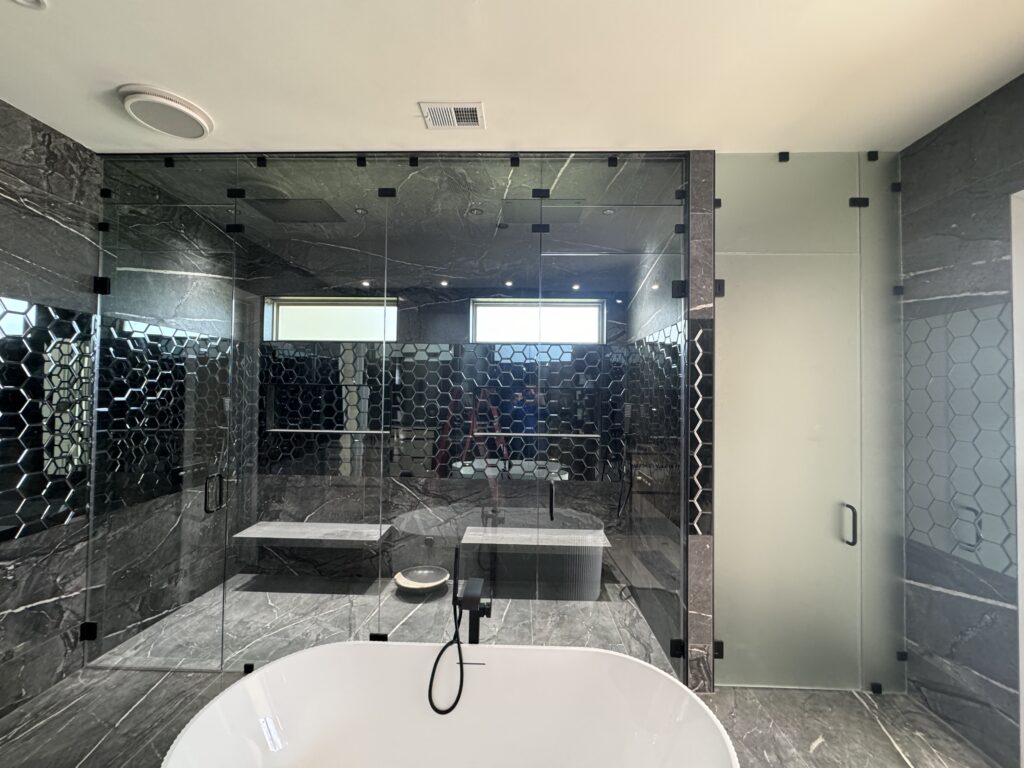 Modern bathroom with glass shower enclosure